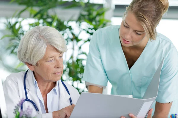 Woman Nurse Doctor Working Together — Stock Photo, Image