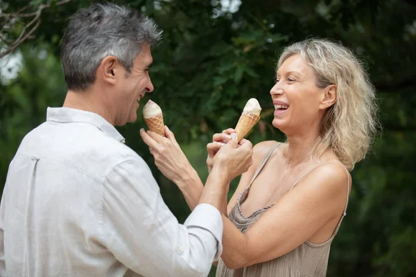 Mature Couple Enjoying Ice Cream Together — 图库照片