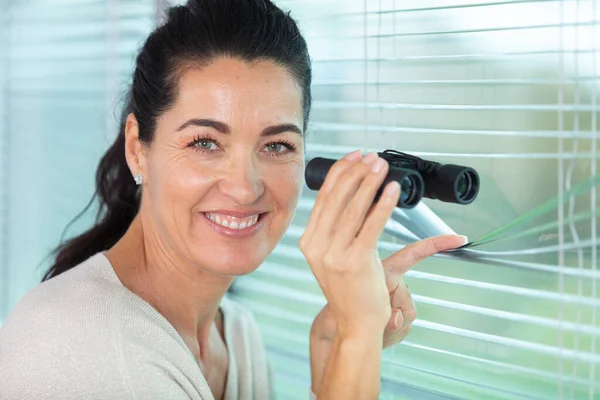 Nosy Woman Peering Some Blinds — Stock Photo, Image