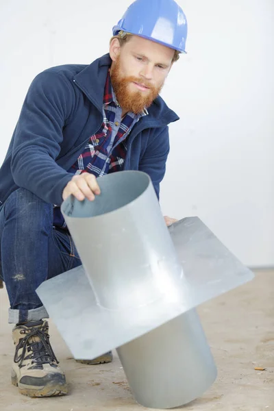 Builder Examining Metal Chimney Flue — Stock Photo, Image