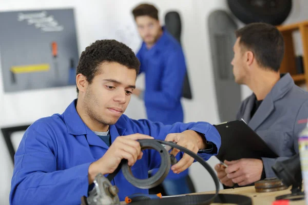Man Apprentices Holding Bearing — Stock Photo, Image
