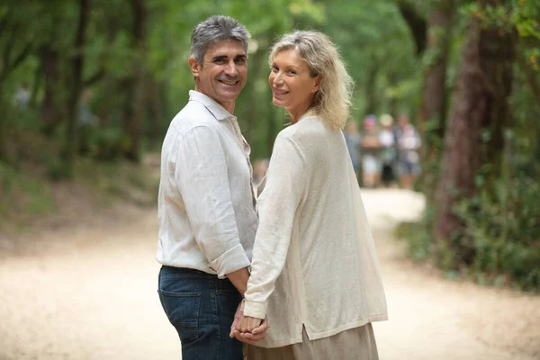 Cute Middle Aged Couple Embracing Outdoors — Stock Photo, Image