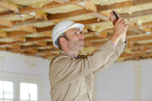 Handsome Male Builder Taking Photos His Mobile Phone — Stock Photo, Image