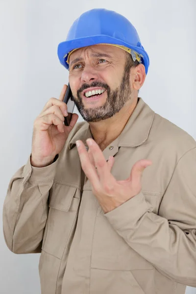 Portrait Annoyed Engineer Using Mobile Phone — Stock Photo, Image