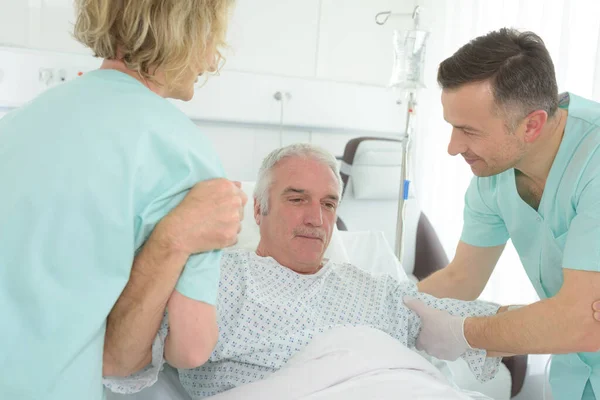 Supporting Senior Man Bed — Stock Photo, Image