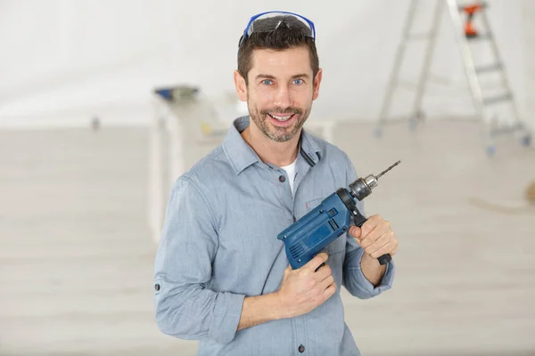 Man Drilling Home — Stock Photo, Image