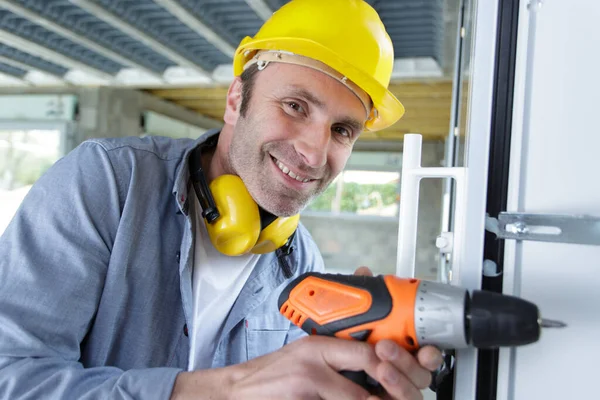 Gelukkig Man Boren Muur Met Boor Perforator — Stockfoto