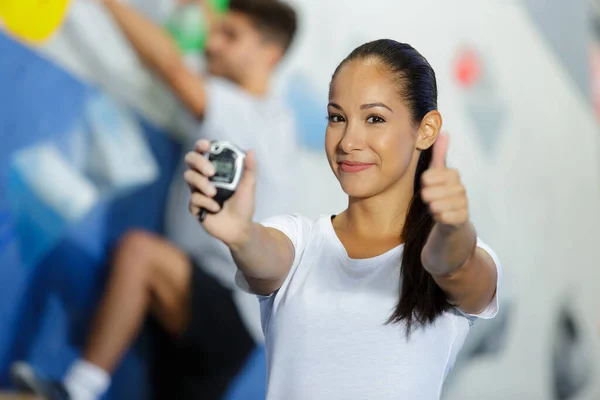 Female Trainer Showing Stop Watch — Stock Photo, Image