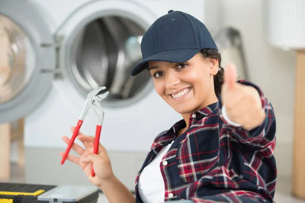Young Plumber Woman Smiling Broadly Showing Thumbs — Stock Photo, Image