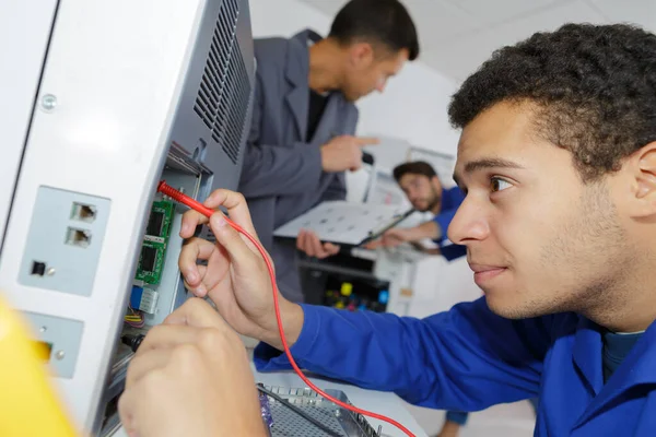 Technician Fixing Cables Man — Stock Photo, Image