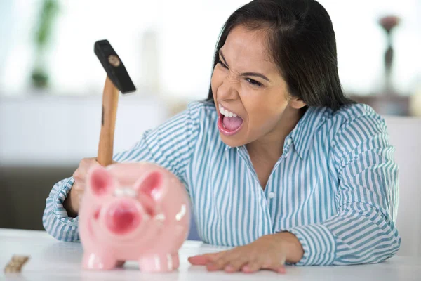 Angry Woman Breaking Piggy Bank — Stock Photo, Image