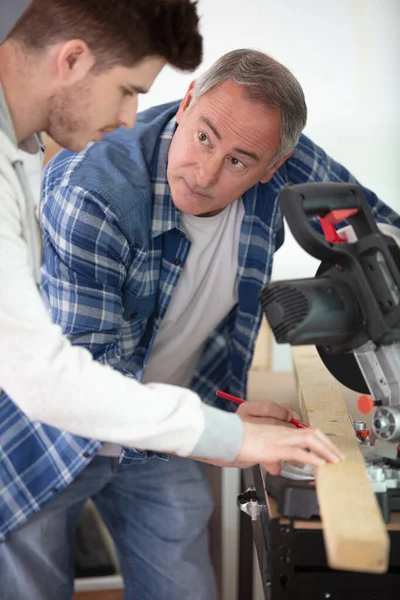 Apprentice Learning How Cut Wood Circular Saw — Stock Photo, Image