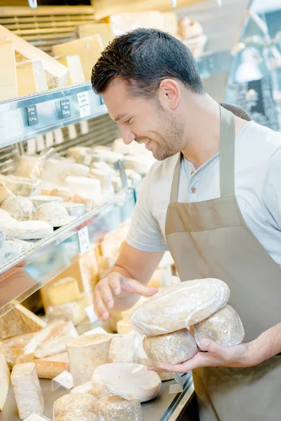 Shop Assistant Restocking Shelf Cheese — Stock Photo, Image