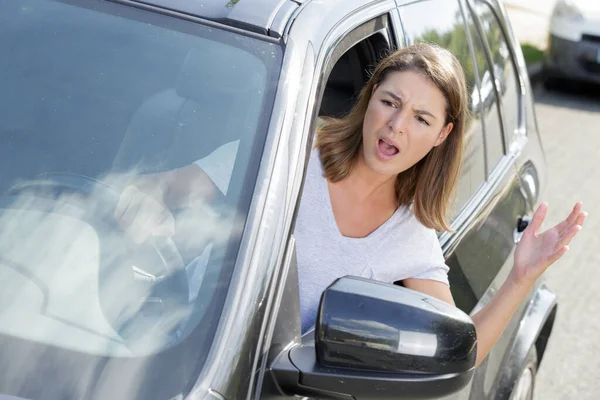 Aggressive Woman Shouting Out Window — Stock Photo, Image