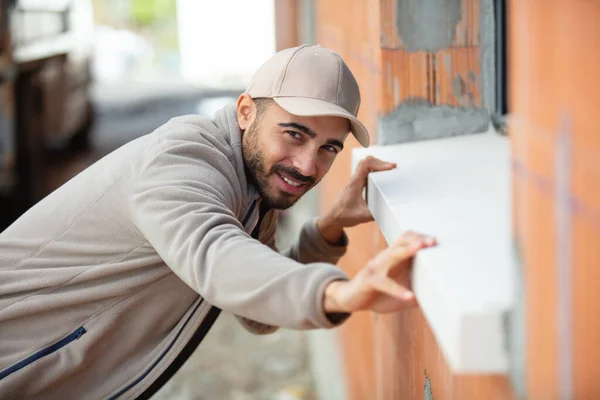 Male Builder Checking Window Installation Construction Site — Stock Photo, Image