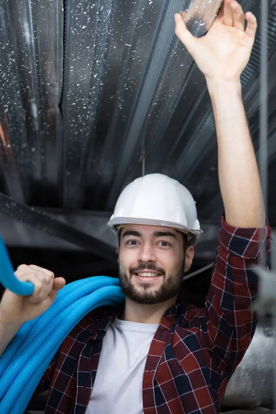 Confident Electrician Fixing Pipes — Stock Photo, Image