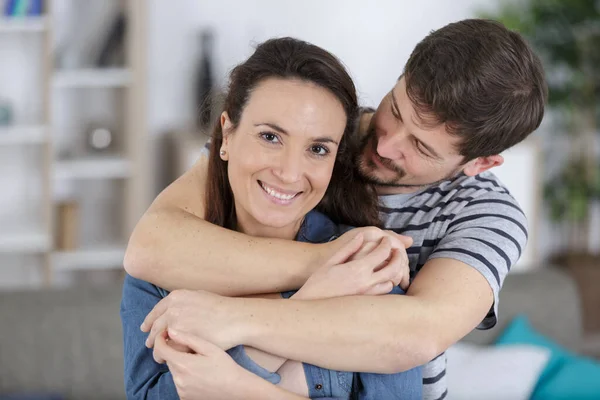 Affectionate Couple Embracing Woman Looking Camera — Stock Photo, Image