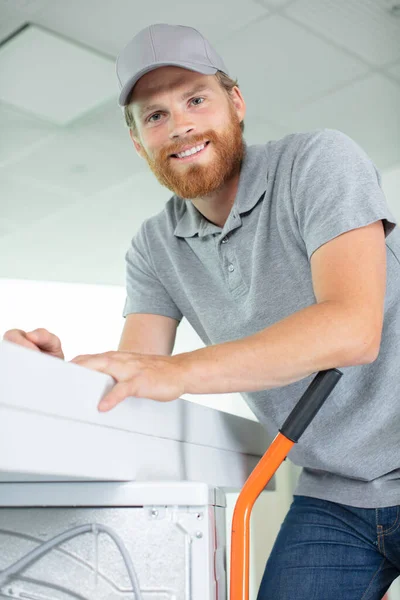 Young Happy Man Carrying Washer — Stock Photo, Image