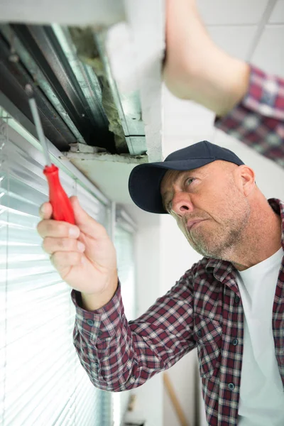Man Using Screwdriver Window — Stock Photo, Image