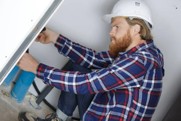 Young Man Builder Helmet Working Alone — Stock Photo, Image