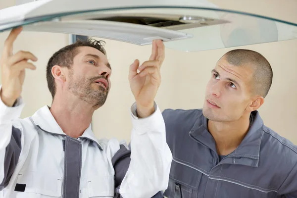 Two Contractors Fitting Ceiling Vent — Stock Photo, Image