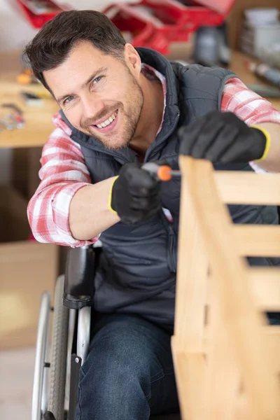 Disabled Man Assembling Furniture Workshop — Stock Photo, Image