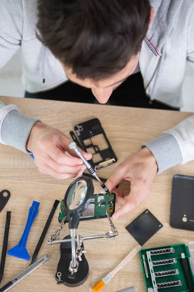 Close Human Hand Repairing Smartphone Screwdriver — Stock Photo, Image