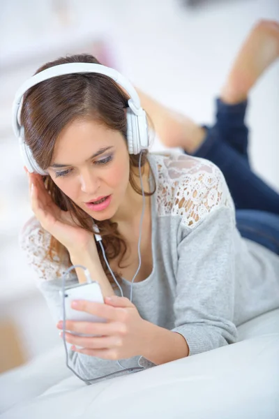 Woman Wearing Headphones Looking Smartphone Shocked Expression — Stock Photo, Image