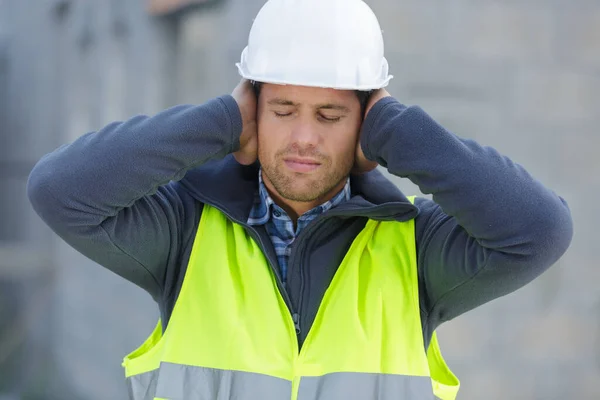 Engineer Covering Ears Closing Eyes — Stock Photo, Image