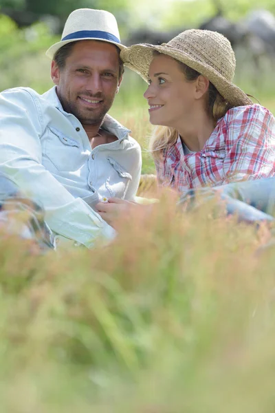 Couple Love Laying Grass Looking Camera — Stock Photo, Image