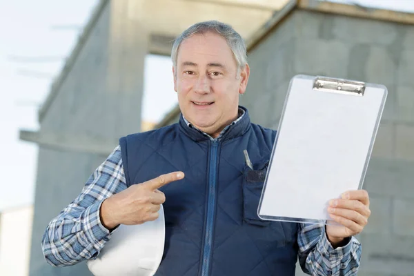 Senior Engineer Standing Holding Clipboard Pointing — Stock Photo, Image