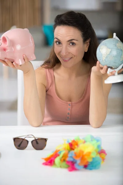 Happy Woman Putting Money Piggy Bank — Stock Photo, Image