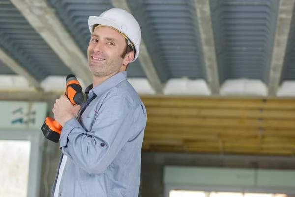 Bearded Guy Drilling Hole Standard Electric Drill — Stock Photo, Image