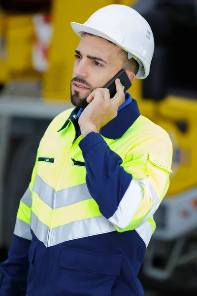 Young Male Engineer Construction Site Using Smart Phone — Stock Photo, Image