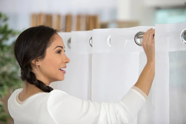 Young Woman Installing Curtains Home — Stock Photo, Image