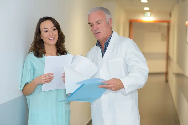 Doctor Nurse Discussing Medical Report Hospital — Stock Photo, Image