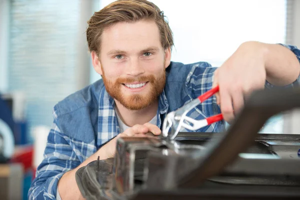 Young Male Mechanic Using Long Nosed Pliers — Stock Photo, Image
