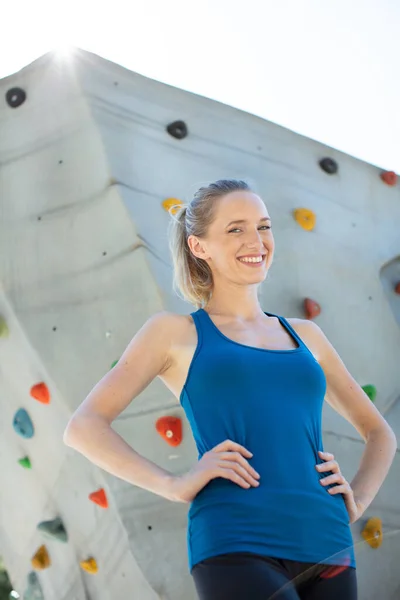 sporty successful woman being busy at her hobby-bouldering