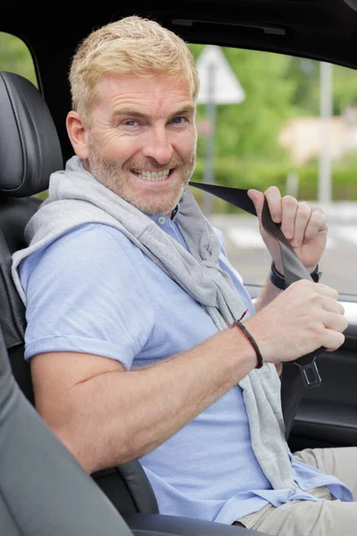 Man Putting Belt Driving — Stock Photo, Image