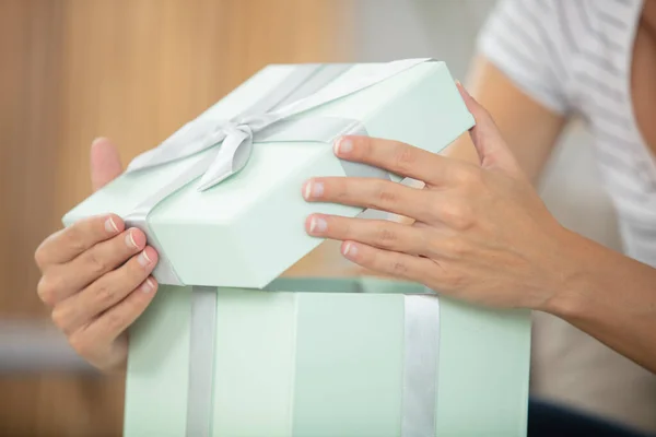 Pleasant Woman Opening Gift Box — Stock Photo, Image