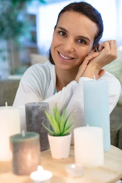 Happy Woman Home Candles Table — Stock Photo, Image