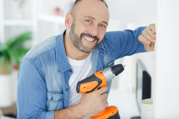 Middle Aged Man Using Drill — Stock Photo, Image