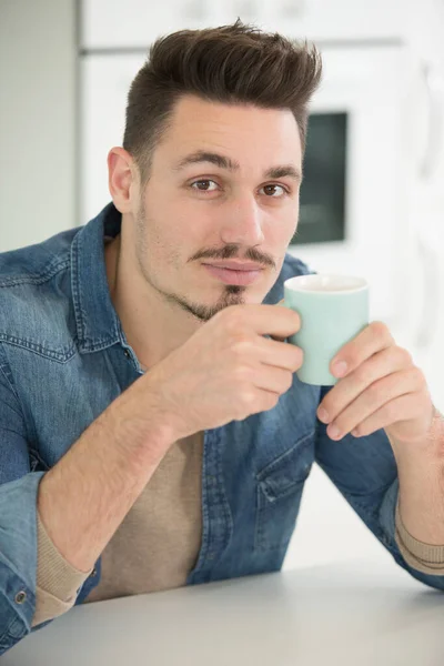 Portrait Young Man His Kitchen Holding Cup — Stock Photo, Image