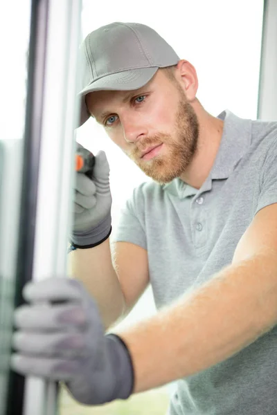 Handsome Young Man Installing Bay Window Construction Site — Stock Photo, Image