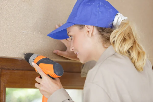 Woman Builder Drilling Wall — Stock Photo, Image