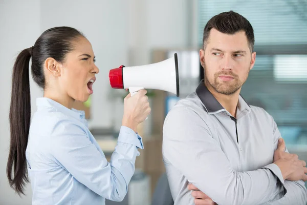 Angry Female Boss Shouting Megaphone Oblivious Male Employee — Stock Photo, Image