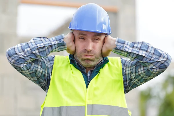 Construction Suffering Noise Pollution Building Site — Stock Photo, Image
