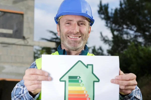 Constructor Mostrando Gráfico Eficiencia Energética — Foto de Stock