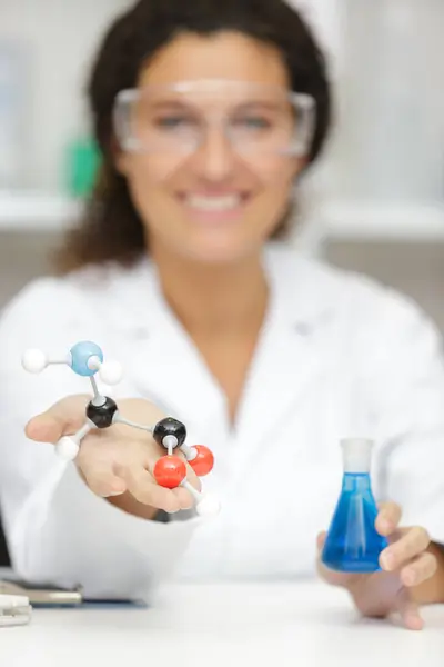 Female Scientist Holding Molecules Model Glass Flask — Stock Photo, Image