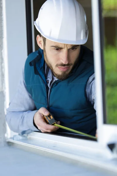 Man Measuring Window Prior Installation Roller Shutter Outdoors — Stock Photo, Image